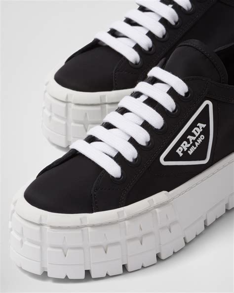 prada cap-toe gabardine sneakers|Prada double wheel sneakers.